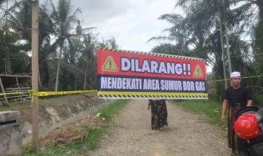 Aparat Desa Pasang Spanduk Larangan Dekati Sumur Bor Gas di Aceh Utara