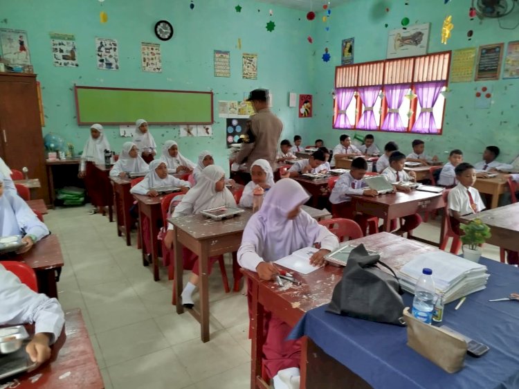 Polsek Muara Dua Dampingi Penyaluran 7.301 Porsi Makanan Bergizi Gratis