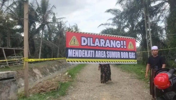 Aparat Desa Pasang Spanduk Larangan Dekati Sumur Bor Gas di Aceh Utara